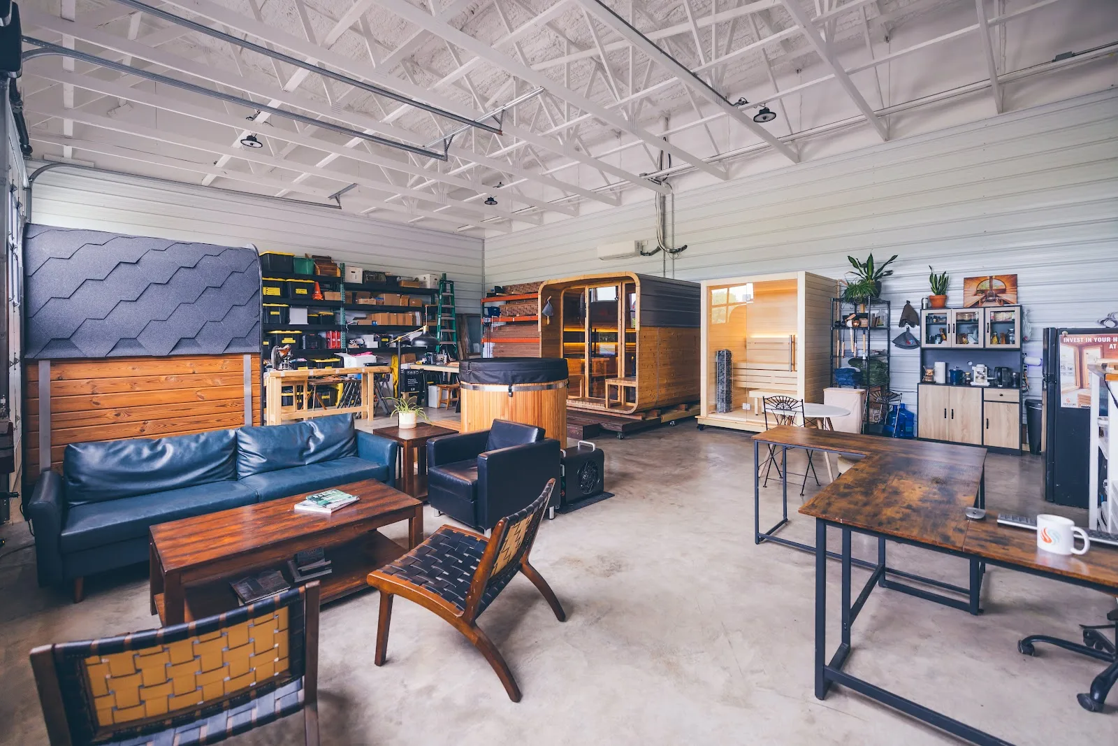 Chillfire showroom lounge with seating, sauna displays and a consultation table