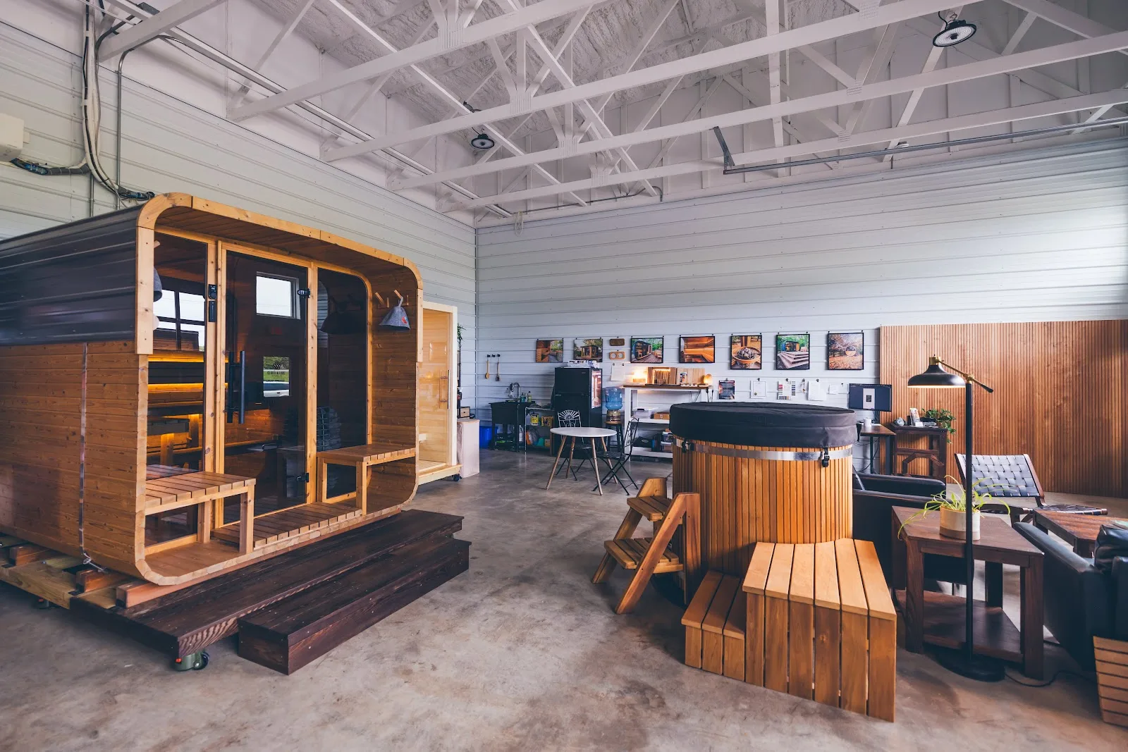 Inside the Chillfire showroom with a full-size sauna, wooden plunge tub and seating